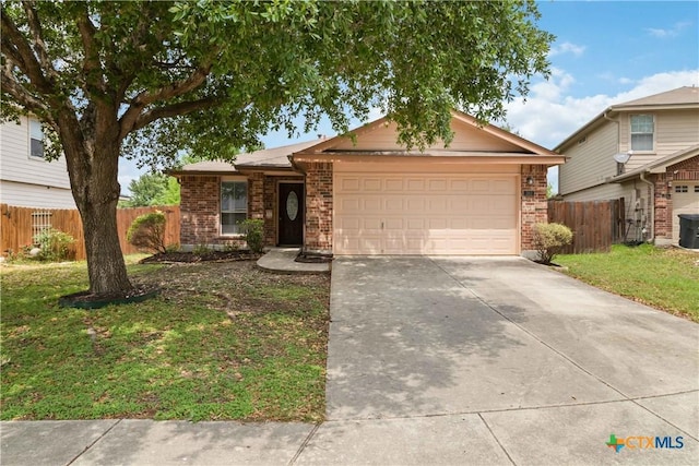 ranch-style house featuring brick siding, fence, a garage, a front lawn, and concrete driveway