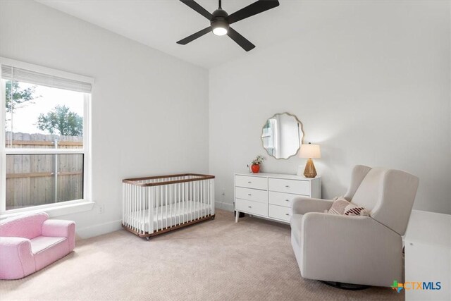 813 Eagle Heights Dr, Salado, TX 76571 - bedroom featuring a nursery area, carpet, and ceiling fan