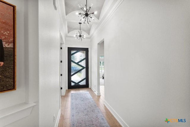 813 Eagle Heights Dr, Salado, TX 76571 - doorway to outside featuring a chandelier, lofted ceiling, crown molding, and baseboards