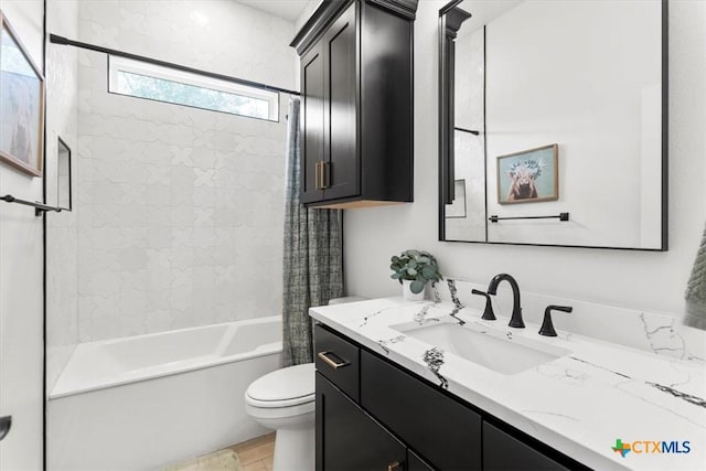 813 Eagle Heights Dr, Salado, TX 76571 - full bathroom featuring toilet, vanity, shower / tub combo, and wood finished floors