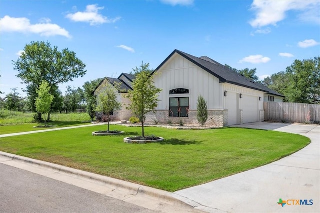 813 Eagle Heights Dr, Salado, TX 76571 - view of front of home featuring board and batten siding, driveway, and an attached garage