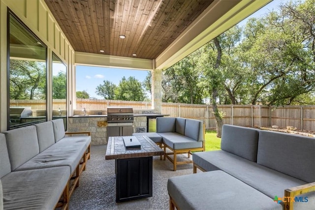 813 Eagle Heights Dr, Salado, TX 76571 - view of patio featuring outdoor lounge area, a grill, area for grilling, and a fenced backyard