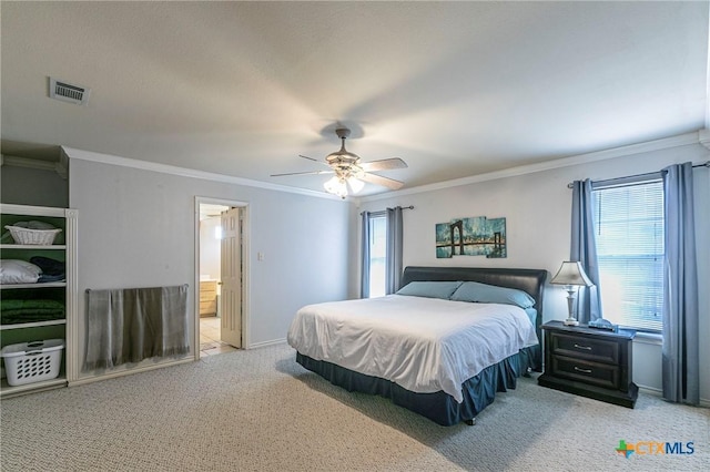 bedroom featuring multiple windows, ornamental molding, and light colored carpet