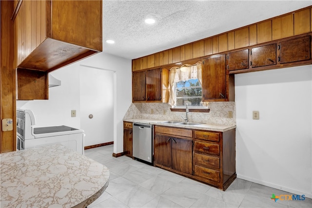 kitchen featuring dishwasher, a textured ceiling, range, sink, and tasteful backsplash