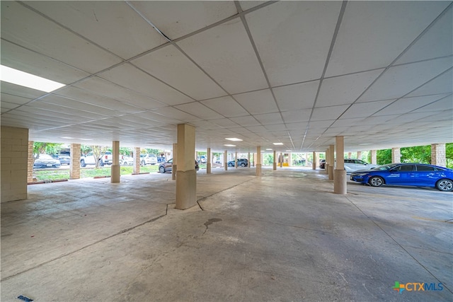 garage featuring a carport