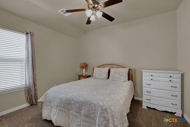 carpeted bedroom with ceiling fan and lofted ceiling