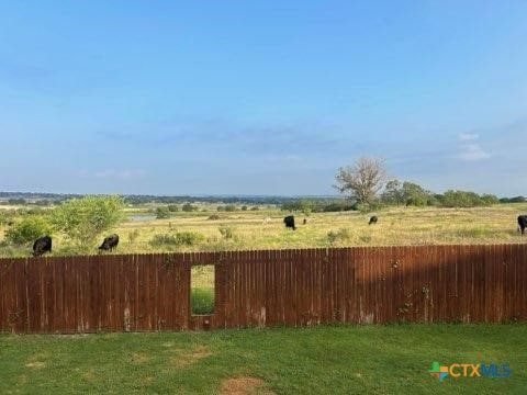 view of yard featuring a rural view