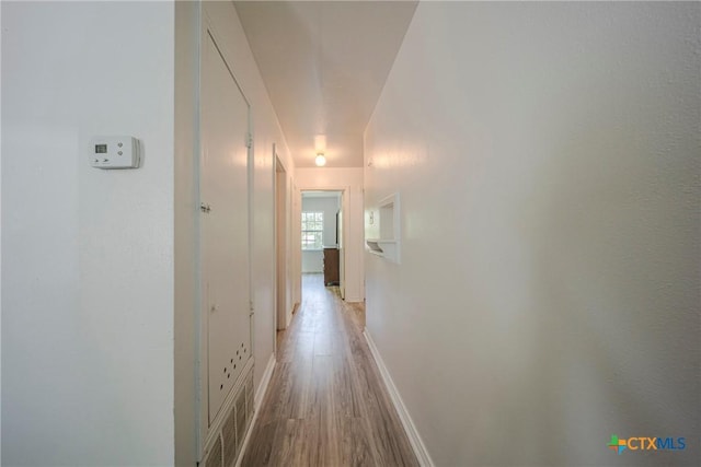 2613 Goliad St, Temple, TX 76501 - hall with light wood-style flooring and baseboards