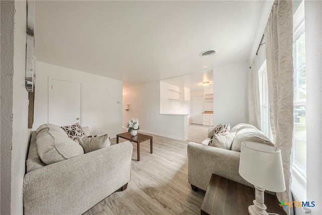 2613 Goliad St, Temple, TX 76501 - living area featuring light wood-style floors and baseboards