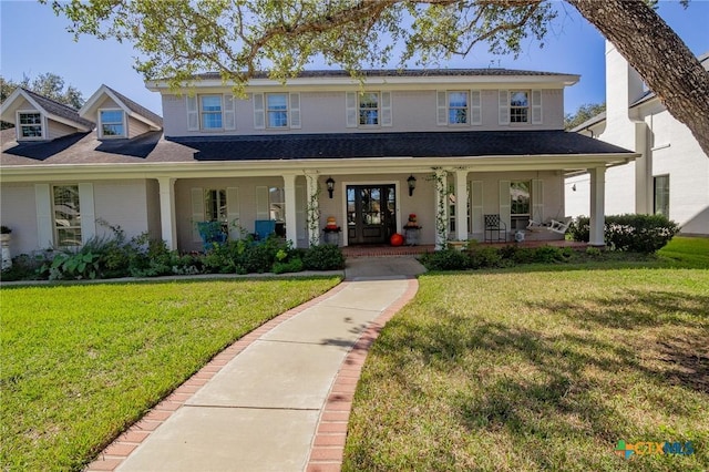 view of front of home featuring a porch and a front yard