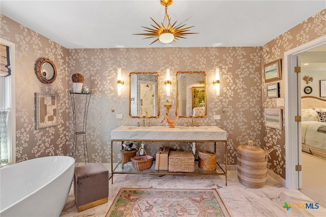 bathroom with a bathtub and vanity