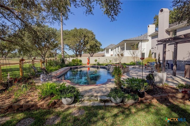 view of pool with a patio area