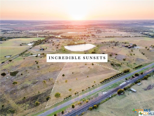 aerial view at dusk with a rural view