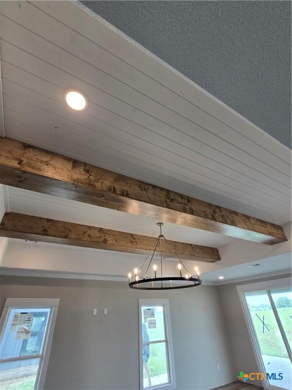 8186 S Lone Star Pkwy, Moody, TX 76657 - interior details with a chandelier and beamed ceiling