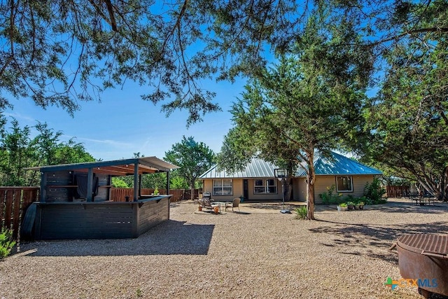 10 Long Bow Ln, Wimberley, TX 78676 - rear view of house with a patio area