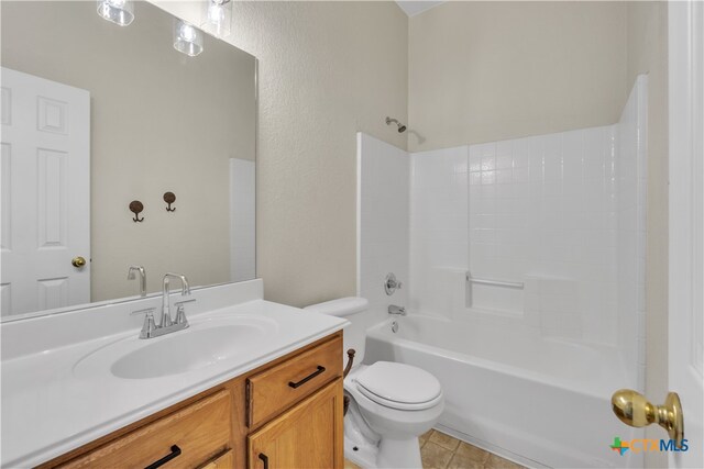 full bathroom with toilet, bathtub / shower combination, vanity, and tile patterned flooring