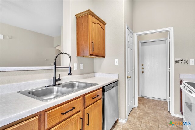 kitchen with dishwasher, sink, and white stove