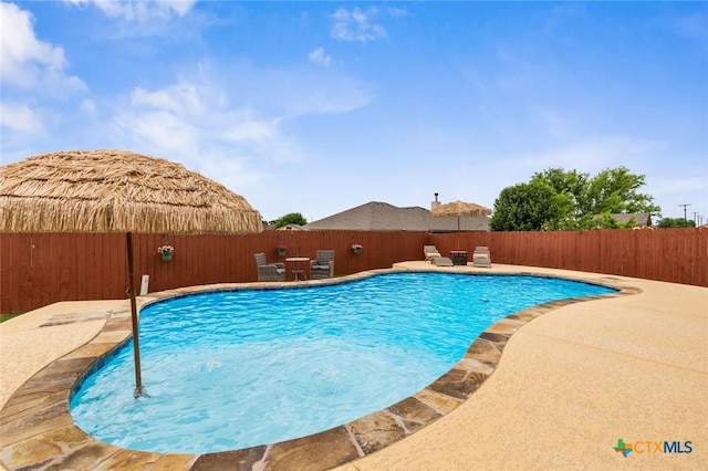 2017 Wagon Gap Rd, Temple, TX 76502 - view of swimming pool with a fenced in pool, fence, and a patio