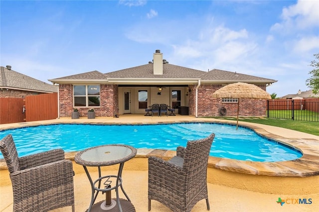 2017 Wagon Gap Rd, Temple, TX 76502 - view of swimming pool with fence, a fenced in pool, and a patio