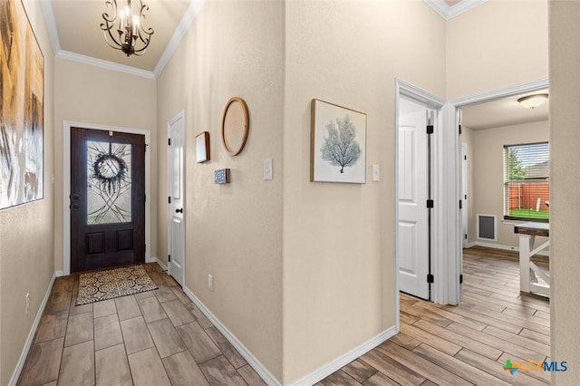 2017 Wagon Gap Rd, Temple, TX 76502 - entryway with baseboards, ornamental molding, and wood tiled floor