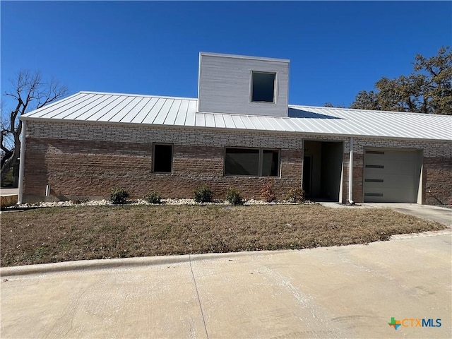 exterior space with a garage