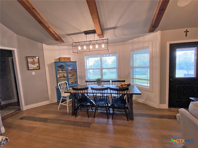 dining space with vaulted ceiling with beams and dark hardwood / wood-style floors