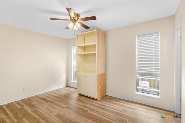 515 Camelot Dr, Victoria, TX 77901 - unfurnished bedroom featuring light wood finished floors and a ceiling fan