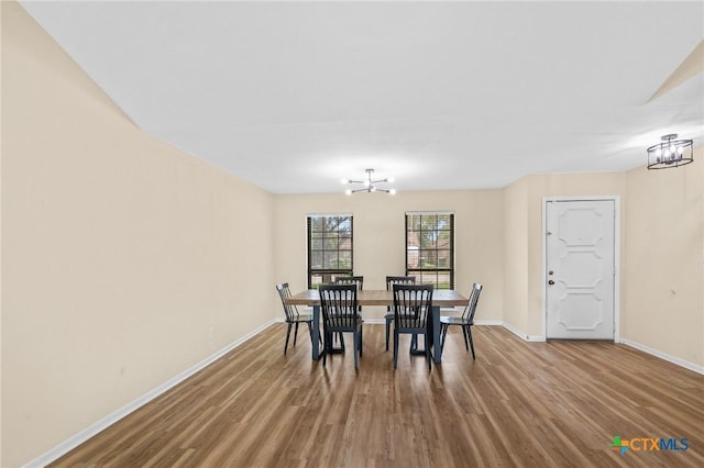 515 Camelot Dr, Victoria, TX 77901 - dining space featuring a chandelier and wood finished floors