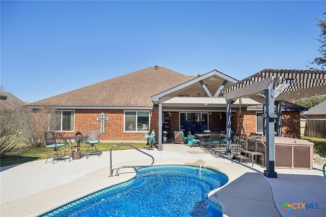 view of pool featuring a patio and a pergola