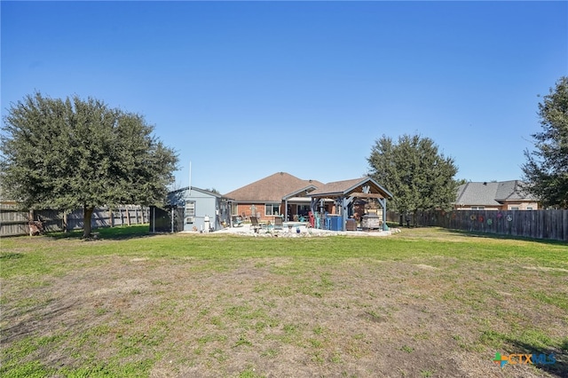 view of yard with a gazebo and a patio area