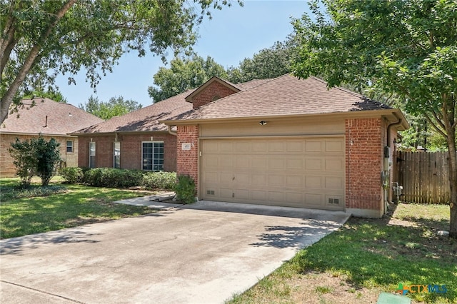 single story home with a garage and a front yard