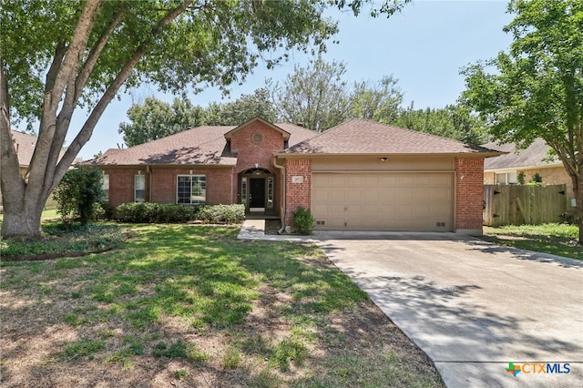 single story home with a garage and a front yard