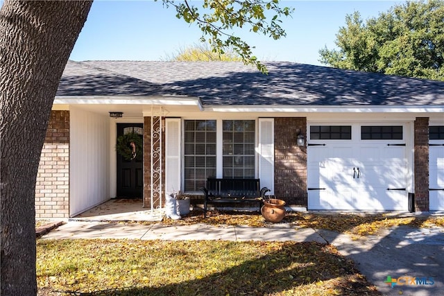 single story home featuring a garage