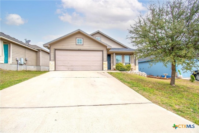 view of front of property featuring a garage, stone siding, a front lawn, and driveway