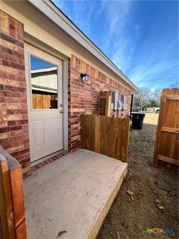 doorway to property with a patio