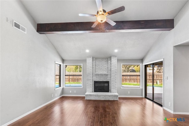 unfurnished living room with lofted ceiling with beams, visible vents, ceiling fan, and wood finished floors