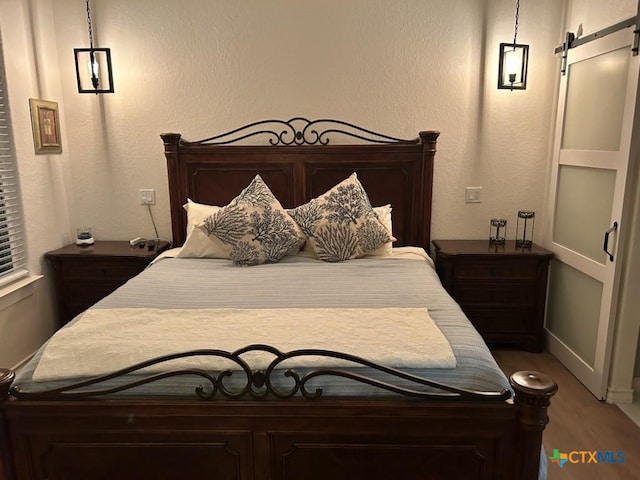 bedroom with a barn door