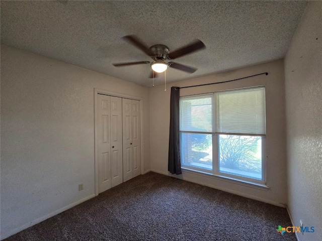 4709 Poppy Wood Cir, Killeen, TX 76542 - unfurnished bedroom featuring carpet floors, a textured ceiling, a closet, a ceiling fan, and baseboards