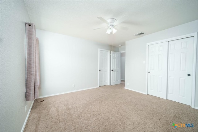 232 Pevero, Cibolo, TX 78108 - unfurnished bedroom featuring carpet, baseboards, a closet, and ceiling fan