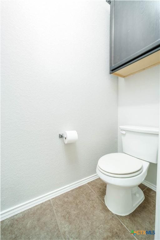 232 Pevero, Cibolo, TX 78108 - bathroom with baseboards, toilet, and tile patterned floors