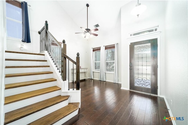 232 Pevero, Cibolo, TX 78108 - foyer featuring a ceiling fan, stairs, wood finished floors, and baseboards