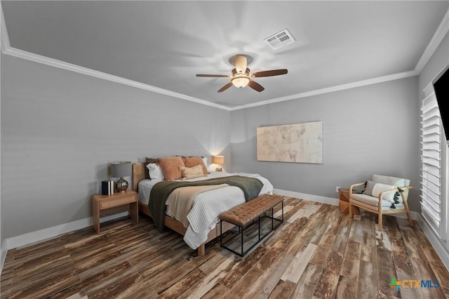 bedroom with ornamental molding, dark hardwood / wood-style floors, and ceiling fan