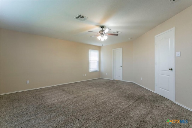 empty room with carpet and ceiling fan