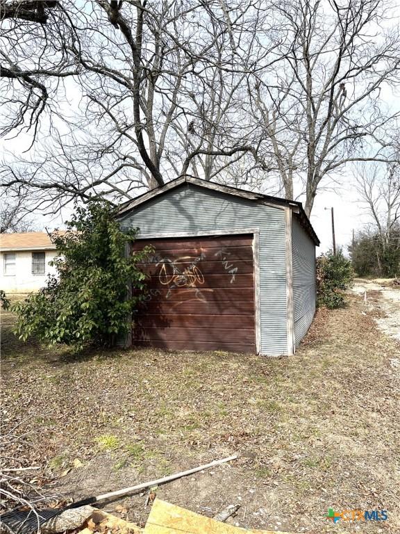 view of outdoor structure featuring a garage