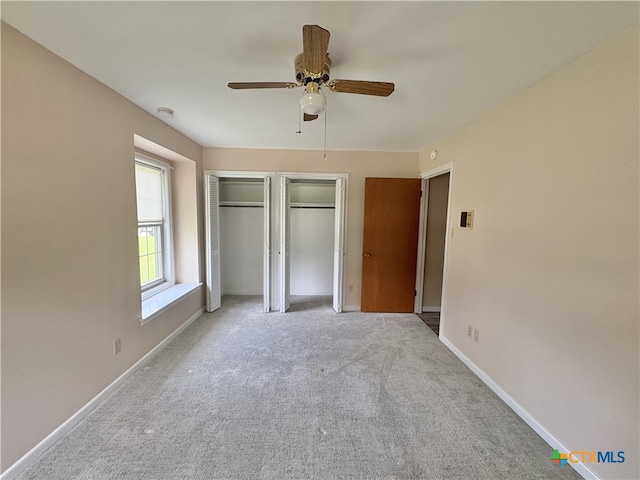 2602 Miori Ln, Victoria, TX 77901 - unfurnished bedroom featuring baseboards, carpet flooring, and a ceiling fan
