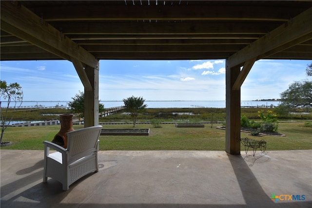 view of patio / terrace featuring a water view