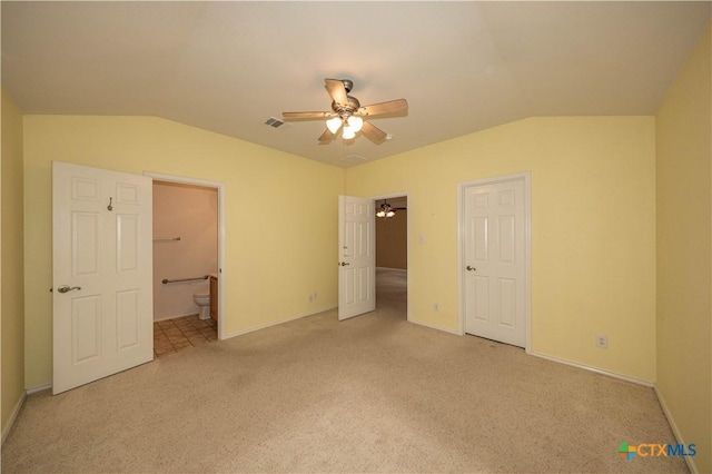 3259 Wren Brook Dr, New Braunfels, TX 78130 - unfurnished bedroom featuring vaulted ceiling, carpet floors, ensuite bath, and baseboards