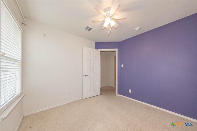 3259 Wren Brook Dr, New Braunfels, TX 78130 - unfurnished bedroom featuring light colored carpet, baseboards, and a ceiling fan