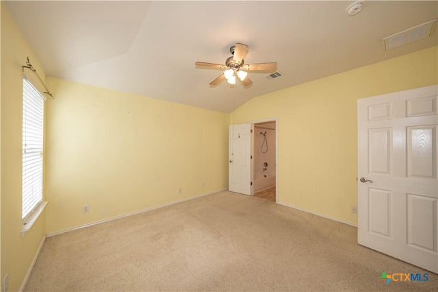 3259 Wren Brook Dr, New Braunfels, TX 78130 - unfurnished bedroom featuring lofted ceiling, light carpet, baseboards, and ceiling fan