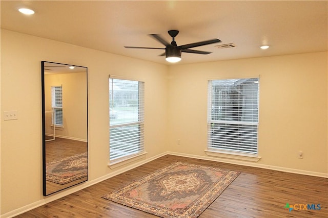 921 N 10th St, Temple, TX 76501 - unfurnished room featuring wood finished floors, a ceiling fan, and recessed lighting